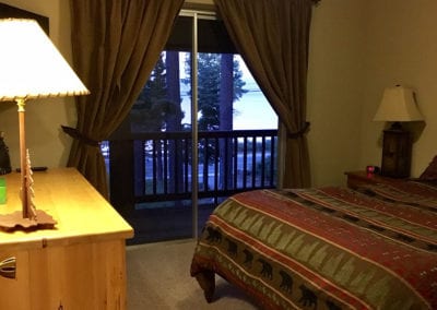 Photo of a bedroom sliding door to balcony